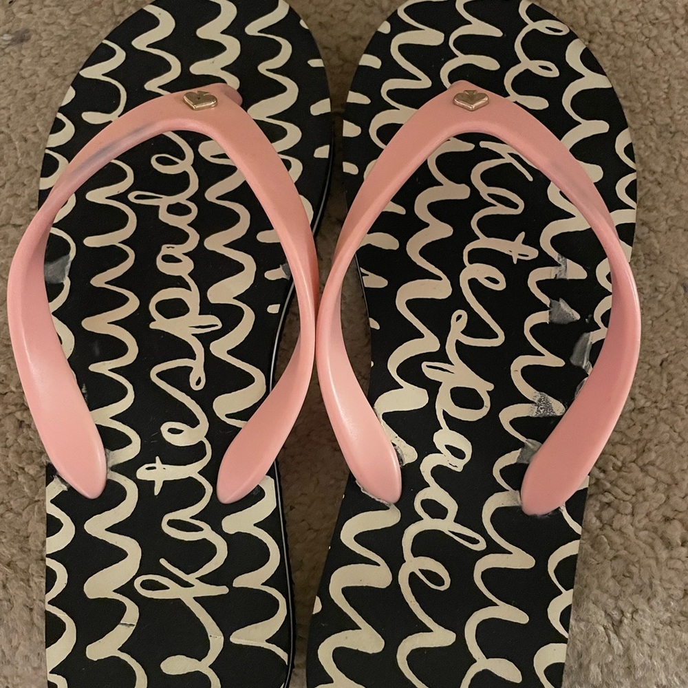 Kate Spade flip flops. Worn once. SIZE 7/8